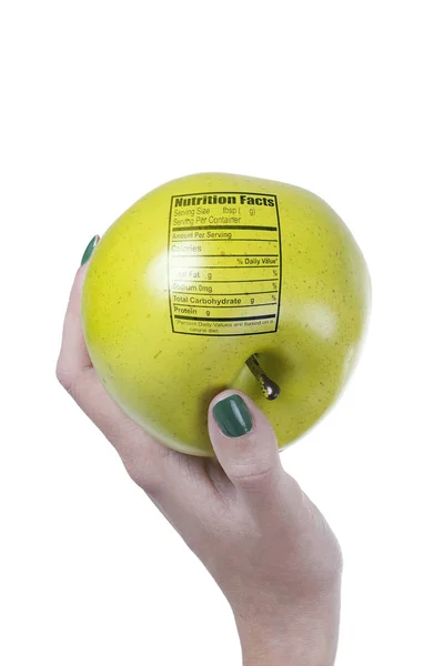 Apple with nutrition facts label — Stock Photo, Image