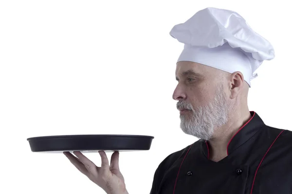 Бородатый повар с подносом в руках — стоковое фото