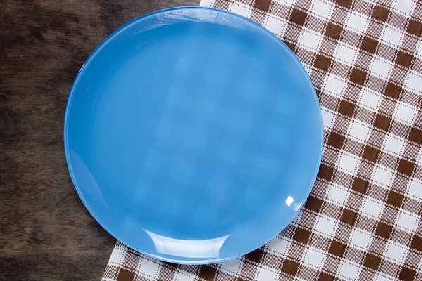 Тарелка и салфетка — стоковое фото