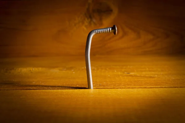 Curved metal nail — Stock Photo, Image