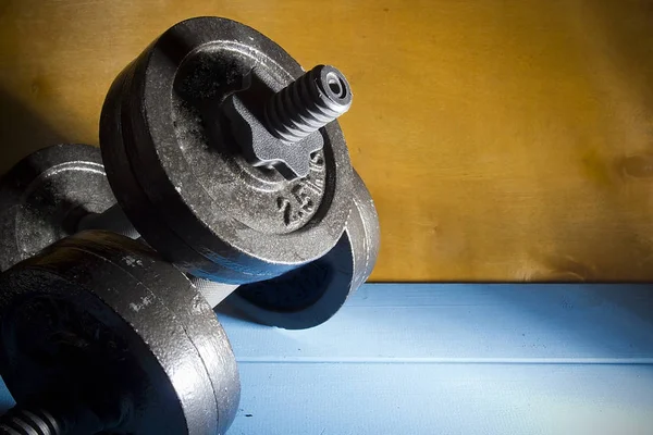 The metal dumbbell. — Stock Photo, Image