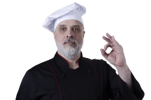 Chef barbudo para a frente com a mão levantada — Fotografia de Stock