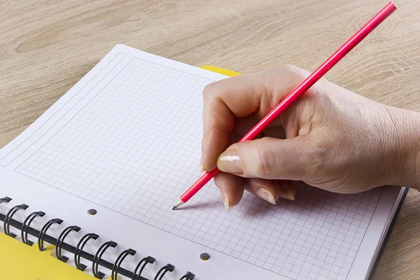 Hand with a pencil — Stock Photo, Image