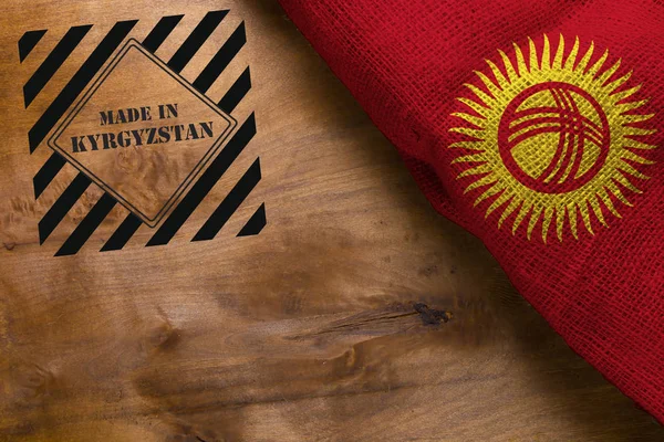 Vlajka Kyrgyzstánu v — Stock fotografie