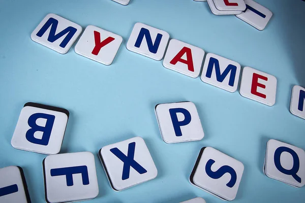 Writing words from cardboard letters — Stock Photo, Image