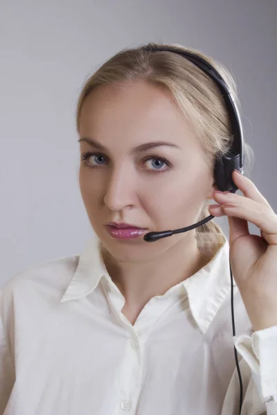 Female call center agent with headset