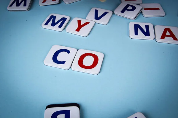 Writing words from cardboard letters — Stock Photo, Image