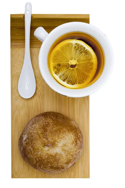 Houska a šálek čaje — Stock fotografie