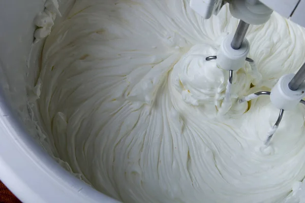 Whipped cream in a mixer — Stock Photo, Image