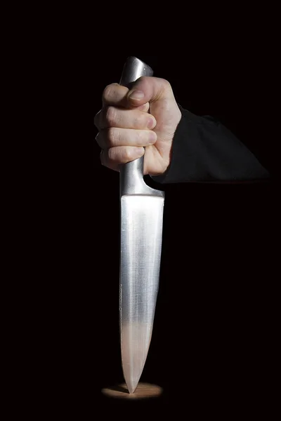 Mão com uma faca — Fotografia de Stock