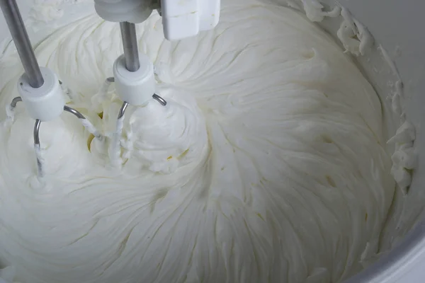 Whipped cream in a mixer — Stock Photo, Image