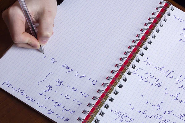 Mathematical formulas in a notebook — Stok fotoğraf