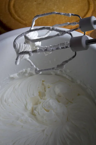 Whipped cream in a mixer — Stock Photo, Image
