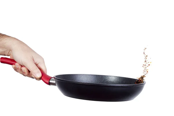 在白底上把锅放在一个人的手里烤 — 图库照片