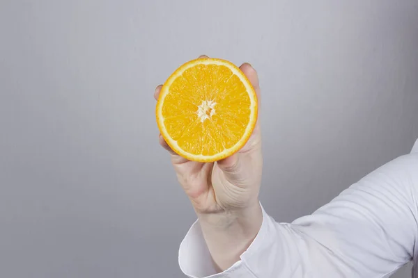 Hand White Coat Orange — Stock Photo, Image