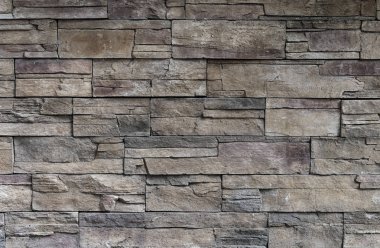 Dekoratif taş duvarına karşı karşıya