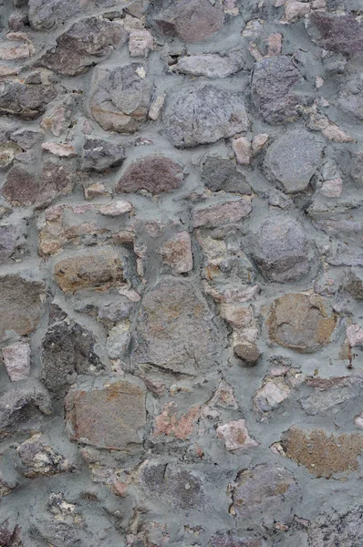 Grijze stenen muur achtergrond — Stockfoto