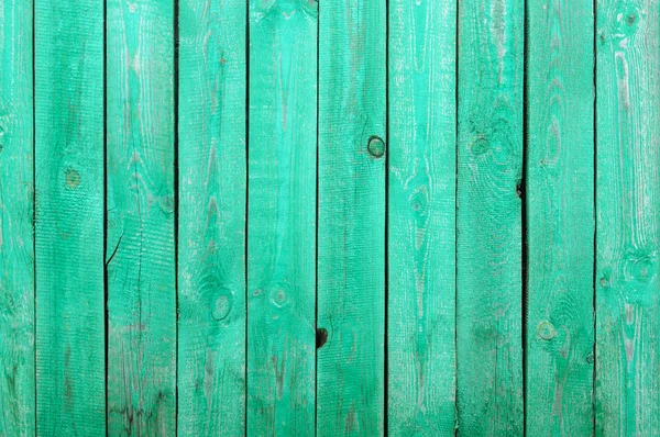 Textura de cerca de madeira pintada verde Fotografia De Stock