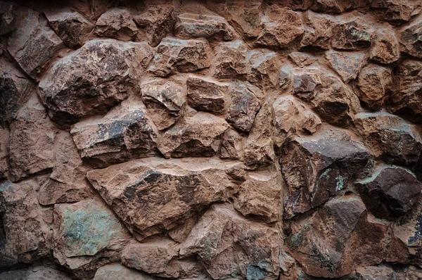 Фон стены из коричневых камней — стоковое фото