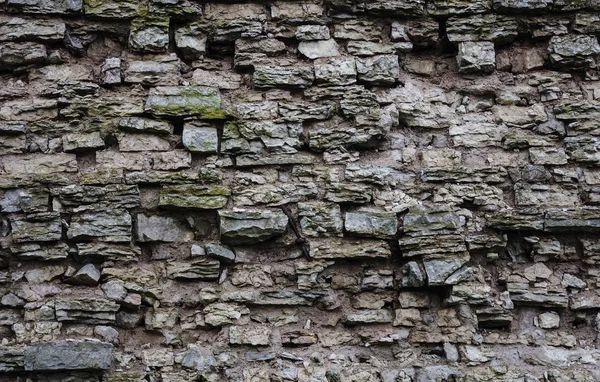 Gamla trasiga grå stenmur bakgrund — Stockfoto