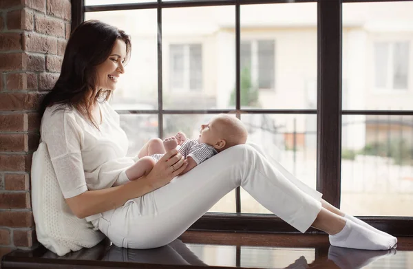 Portrait of happy mother and baby. — Stock Photo, Image