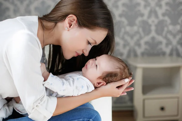 Portrait of happy mother and baby. — Stock Photo, Image