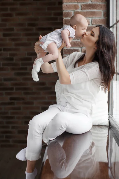 Portrait of happy mother and baby — Stock Photo, Image