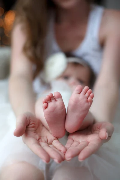 Happy Young Family Mother Holding Foot Her Firstborn Caring Mother — Stock Photo, Image