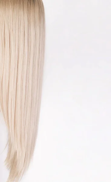 Pattern of a cold blonde hair over white background. — Stock Photo, Image