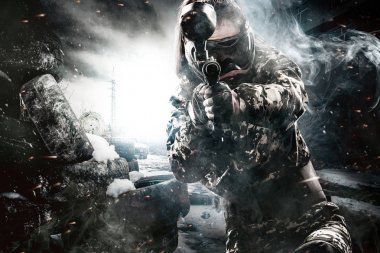 Ağır silahlı maskeli paintball asker sonrası kıyamet arka plan üzerinde. Reklam kavramı.