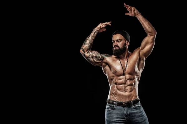Bodybuilder posing. Beautiful sporty guy male power. Fitness muscled man. Spot concept — Stock Photo, Image