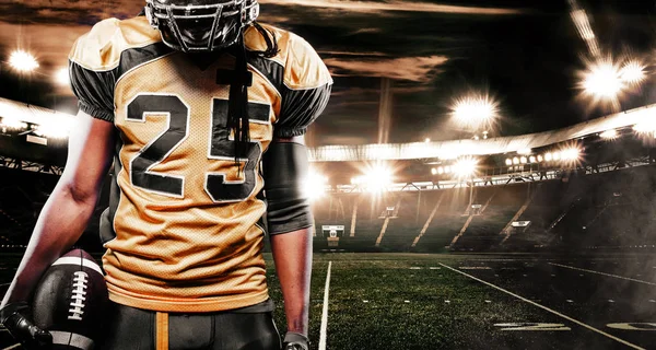 American football sportsman player on stadium. Sport wallpaper with copyspace. — Stock Photo, Image