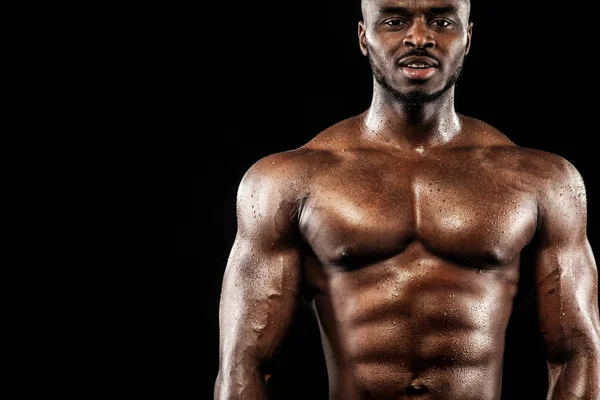 Sports wallpaper on dark background. Power athletic guy bodybuilder. — Stock Photo, Image