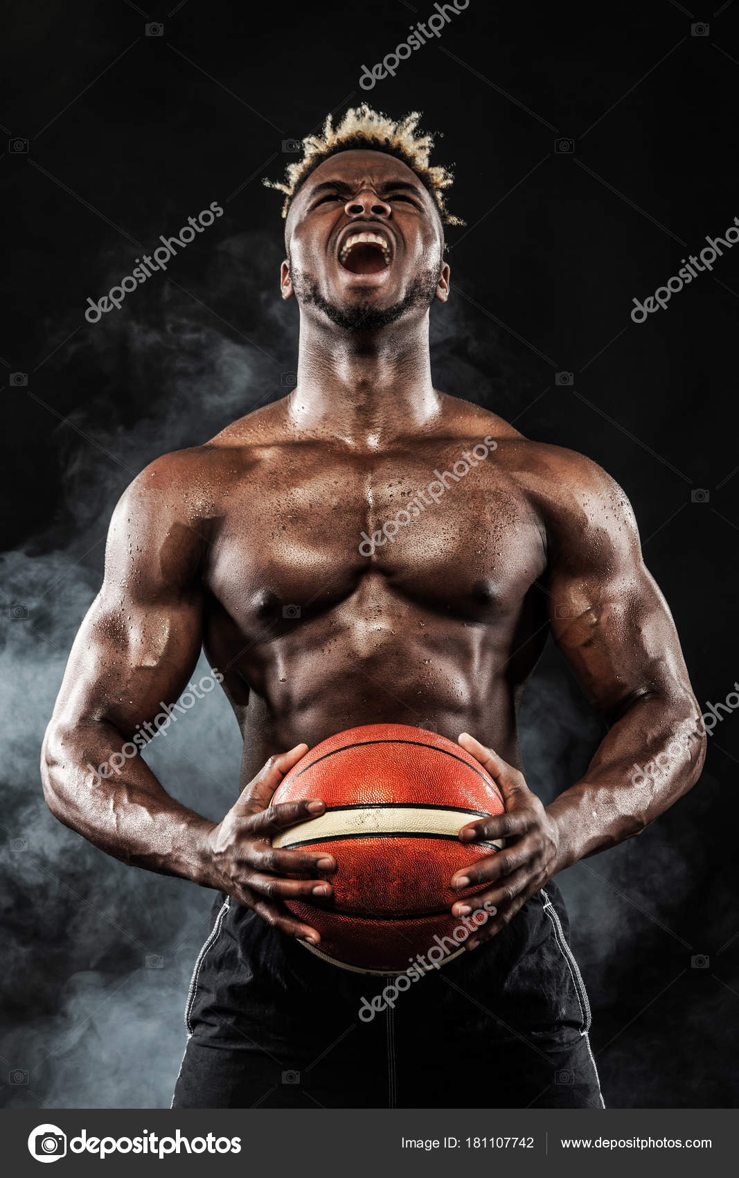 Serious Black Basketball Player with a Ball Next To His Face Stock Image -  Image of giving, fitness: 75746161