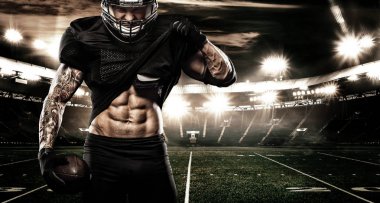 Amerikan Futbol Stadyumu sporcu çalar. Spor afiş ve duvar kağıdı ile boşaltmak.