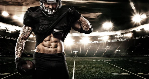 Amerikan Futbol Stadyumu sporcu çalar. Spor afiş ve duvar kağıdı ile boşaltmak.