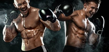 Siyah arka planda eldivenlerle dövüşen iki erkek boksör. Fitness ve boks konsepti. Bireysel spor eğlencesi.