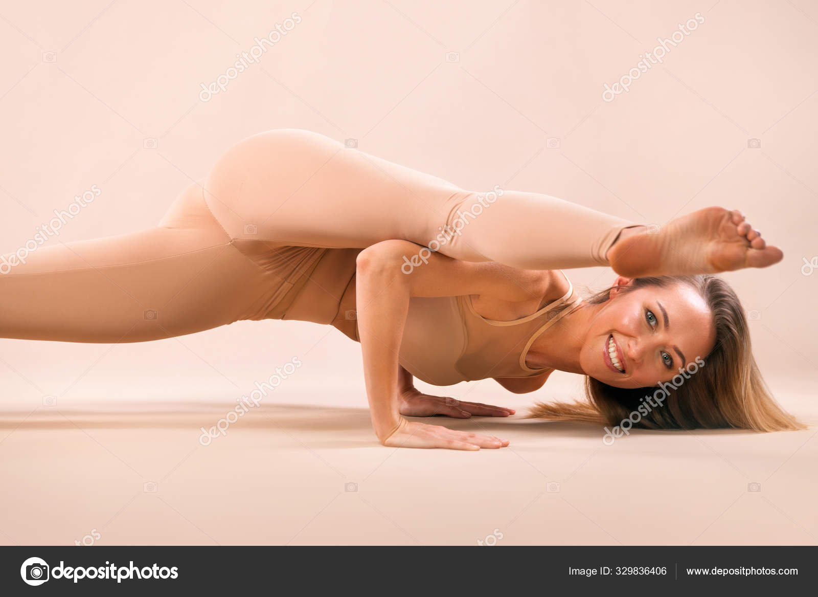 sport woman  nude Indoor Yoga Classes. Sports recreation. Beautiful young woman in asana  pose. Individual sports. Nude sportswear. — Stock Photo © MikeOrlov  #329836406