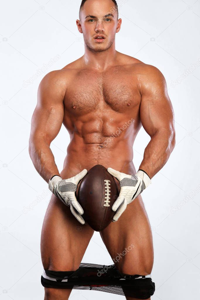 Gay streptizer with naked torso. American football player in helmet isolated on white background.