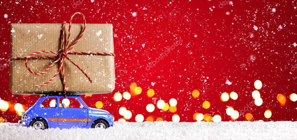 Retro toy car with christmas gifts