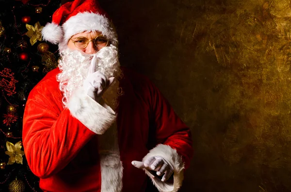 Pai Natal mantém segredos de Natal — Fotografia de Stock