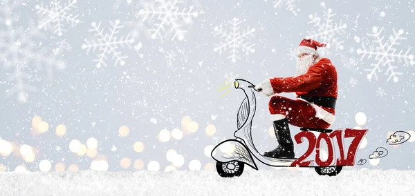Santa Claus en scooter —  Fotos de Stock