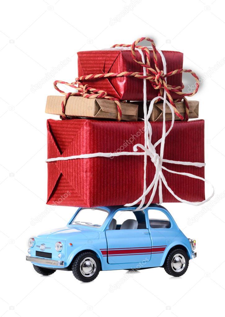 Retro toy car with christmas gifts