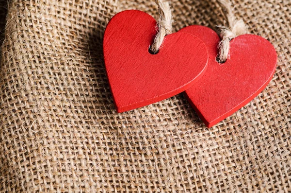 Hearts on canvas background — Stock Photo, Image