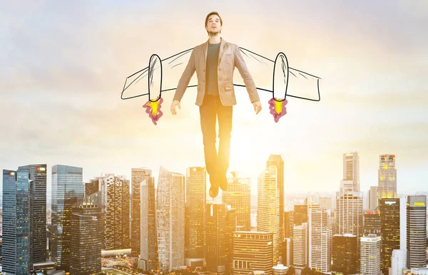 Business man hover over city skyline — Stock Photo, Image