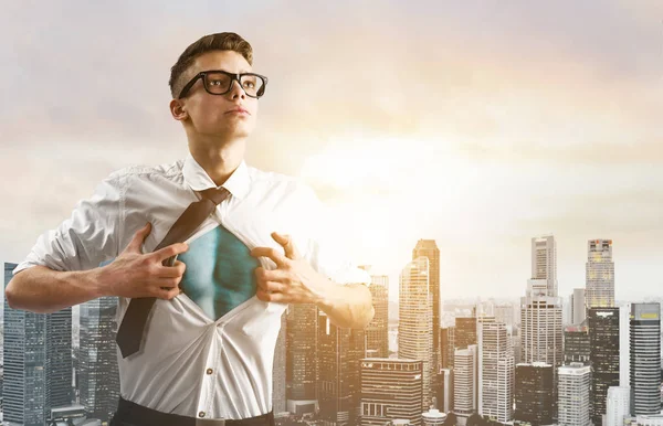 Business super hero hover over city skyline — Stock Photo, Image