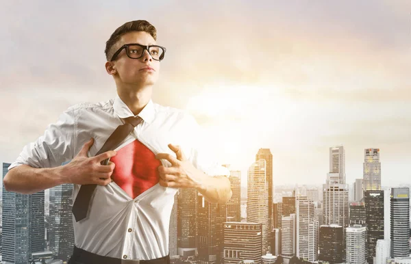 Business super hero hover over city skyline — Stock Photo, Image