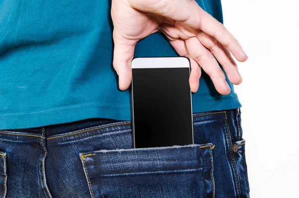 Téléphone portable dans une poche — Photo
