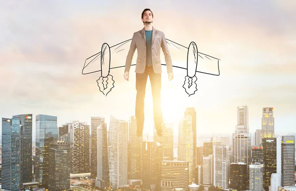 Business man hover over city skyline — Stock Photo, Image