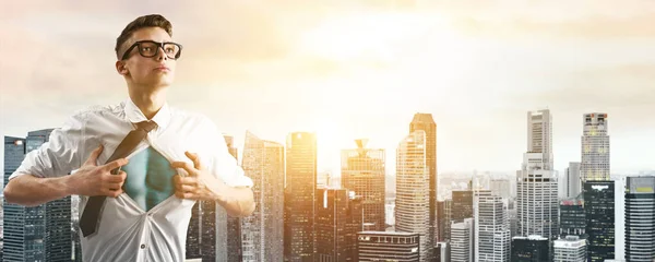 Business super hero hover over city skyline — Stock Photo, Image